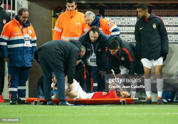 Joao Moutinho of Monaco gets injured during the French League Cup final between Paris Saint-Germain and AS Monaco on March 31, 2018 in Bordeaux,...