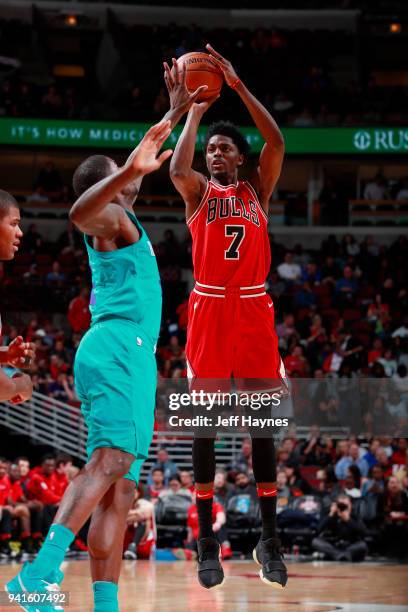 Justin Holiday of the Chicago Bulls shoots the ball against the Charlotte Hornets on April 3, 2018 at the United Center in Chicago, Illinois. NOTE TO...