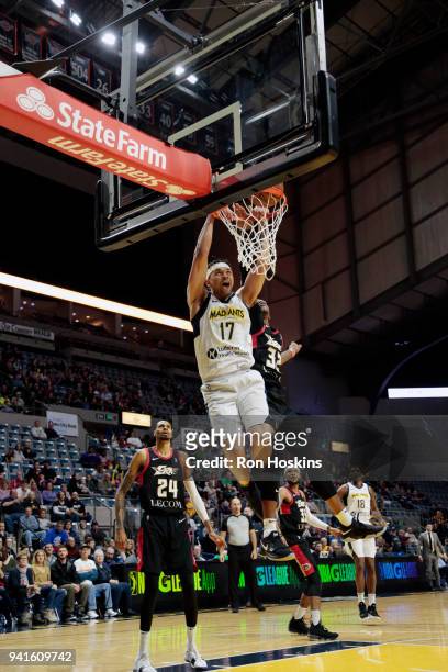 Stephen Hicks of the Fort Wayne Mad Ants battles Craig Sword of the Erie Bayhawks in the 2018 Eastern Conference semi-finals of the NBA G League on...