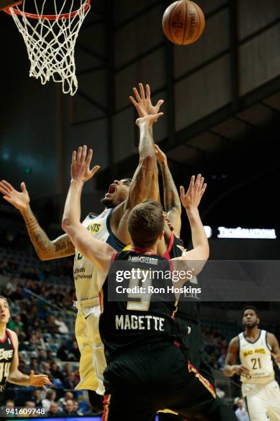 Walt Lemon Jr. #15 of the Fort Wayne Mad Ants battles Josh Magette of the Erie Bayhawks in the 2018 Eastern Conference semi-finals of the NBA G...