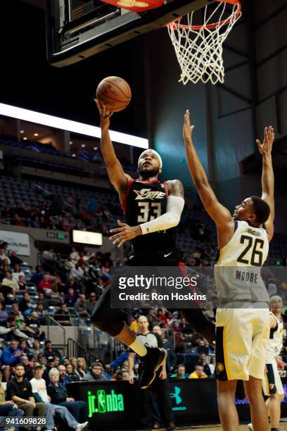 Ben Moore of the Fort Wayne Mad Ants battles Jeremy Hollowell of the Erie Bayhawks in the 2018 Eastern Conference semi-finals of the NBA G League on...