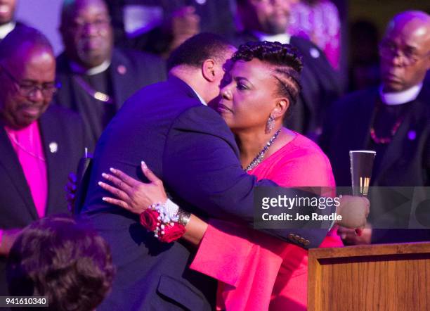 Martin Luther King III and his sister Bernice King hug as they attend the I AM 2018 "Mountaintop Speech" Commemoration at the Mason Temple Church of...