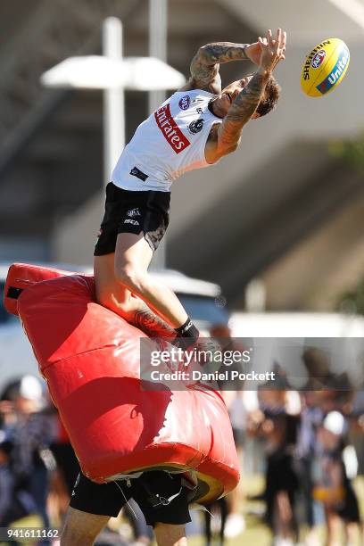 Jamie Elliott of the Magpies attempts to mark the ball during a Collingwood Magpies AFL training session at Holden Centre on April 4, 2018 in...