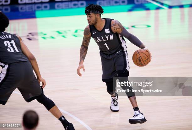 Brooklyn Nets Guard D'Angelo Russell carries the ball at the top of the arc in the first half during the game between the Brooklyn Nets and...