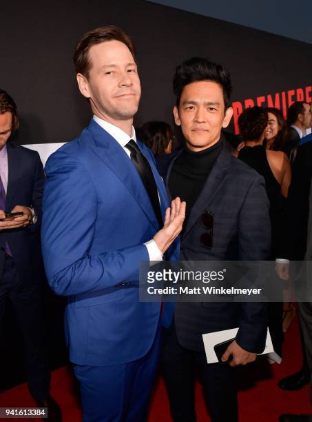 Ike Barinholtz and John Cho attend the premiere of Universal Pictures' "Blockers" at Regency Village Theatre on April 3, 2018 in Westwood, California.