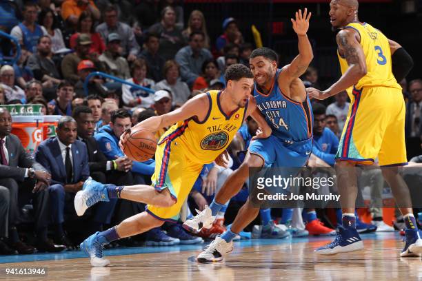 Klay Thompson of the Golden State Warriors jocks for a position during the game against Josh Huestis of the Oklahoma City Thunder on April 3, 2018 at...