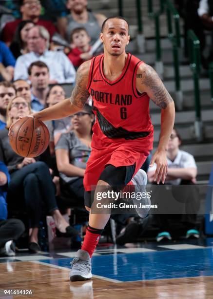 Shabazz Napier of the Portland Trail Blazers handles the ball against the Dallas Mavericks on April 3, 2018 at the American Airlines Center in...