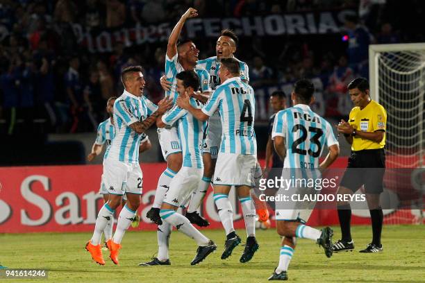 Argentina's Racing Club players celebrate after scoring against Chile's Universidad de Chile during their Copa Libertadores 2018 at the Nacional...