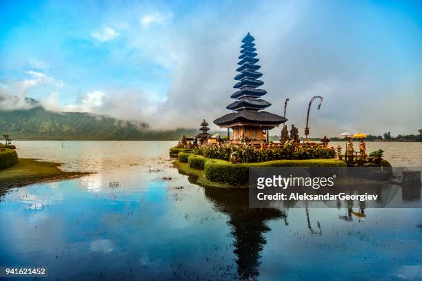 pura ulun danu beratan the floating temple in bali at sunset - indonesia stock pictures, royalty-free photos & images