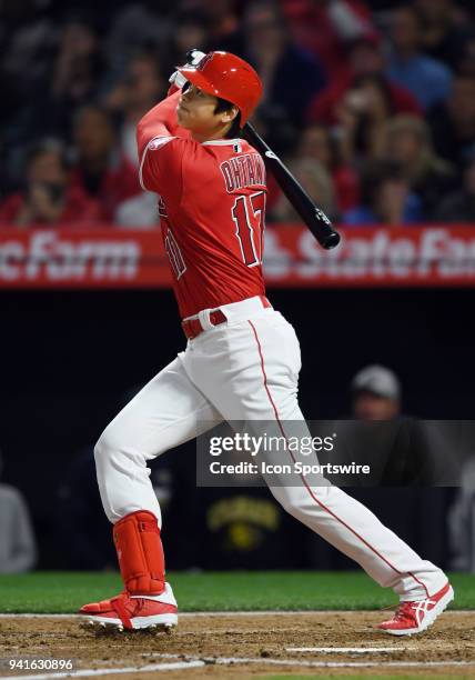 Los Angeles Angels of Anaheim pitcher Shohei Ohtani hits a three run home run in the first inning of a game against the Cleveland Indians played on...