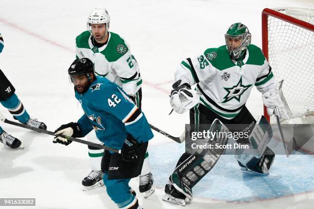 Dan Hamhuis and Mike McKenna of the Dallas Stars defend Joel Ward of the San Jose Sharks at SAP Center on April 3, 2018 in San Jose, California.