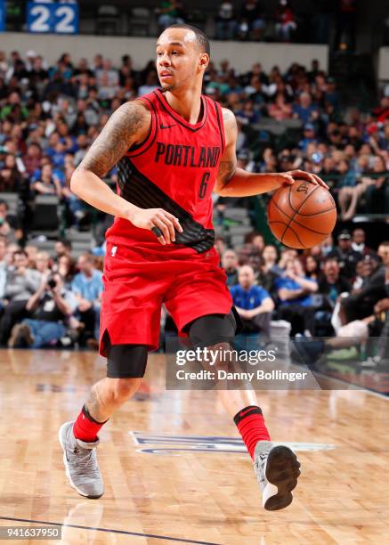 Shabazz Napier of the Portland Trail Blazers handles the ball against the Dallas Mavericks on April 3, 2018 at the American Airlines Center in...