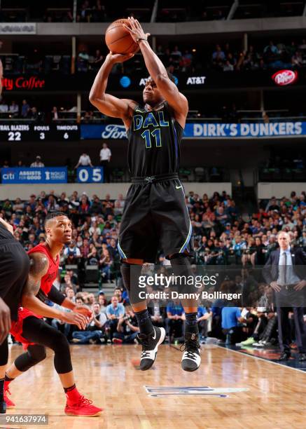 Yogi Ferrell of the Dallas Mavericks shoots the ball against the Portland Trail Blazers on April 3, 2018 at the American Airlines Center in Dallas,...