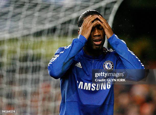 Chelsea's Ivory Coast striker Didier Drogba reacts to missing a chance on goal during their UEFA Champions League Group D match against Apoel Nicosia...