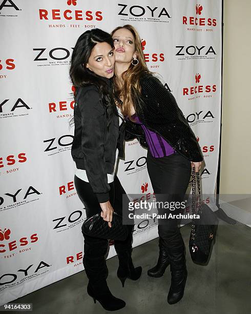 Actresses Ria Sheral & Simona Fusco arrive at Recess LA "Beauty For A Cause" Holiday Toy Drive Event on December 8, 2009 in Los Angeles, California.