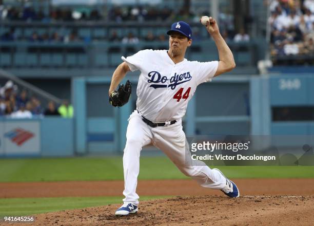 Pitcher Rich Hill of the Los Angeles Dodgers pitches during the third inning of the MLB game against the San Francisco Giants at Dodger Stadium on...