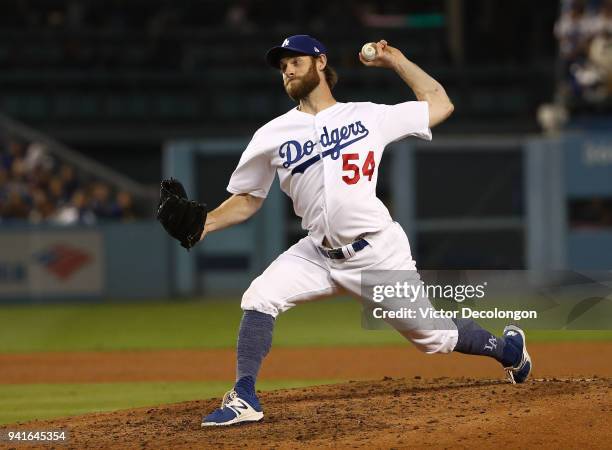 Pitcher Tony Cingrani of the Los Angeles Dodgers pitches during the seventh inning of the MLB game against the San Francisco Giants at Dodger Stadium...