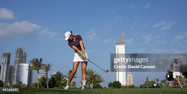 Michelle Wie of the USA plays her second shot at the 13th hole during the first round of the Dubai Ladies Masters, on the Majilis Course at the...