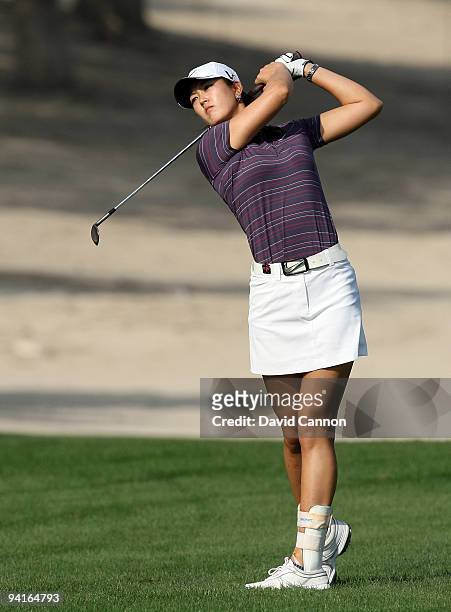 Michelle Wie of the USA plays her second shot at the 17th hole during the first round of the Dubai Ladies Masters, on the Majilis Course at the...