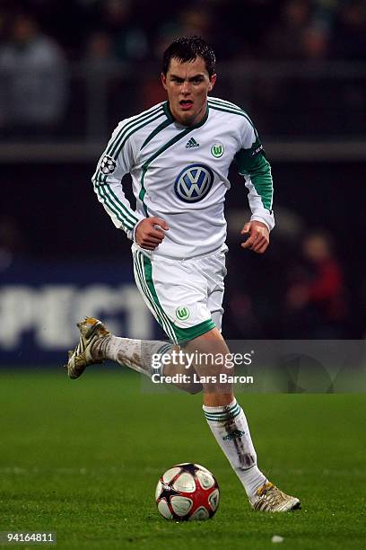 Marcel Schaefer of Wolfsburg runs with the ball during the UEFA Champions League Group B match between VfL Wolfsburg and Manchester United at...