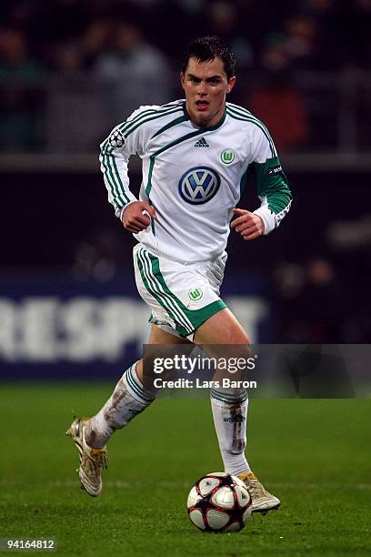 Marcel Schaefer of Wolfsburg runs with the ball during the UEFA Champions League Group B match between VfL Wolfsburg and Manchester United at...