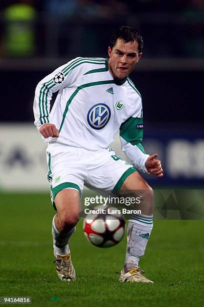 Marcel Schaefer of Wolfsburg runs with the ball during the UEFA Champions League Group B match between VfL Wolfsburg and Manchester United at...