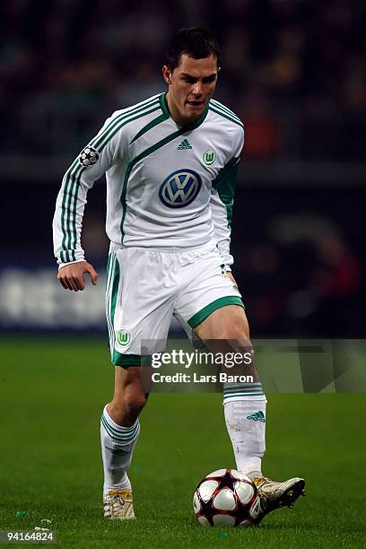 Marcel Schaefer of Wolfsburg runs with the ball during the UEFA Champions League Group B match between VfL Wolfsburg and Manchester United at...