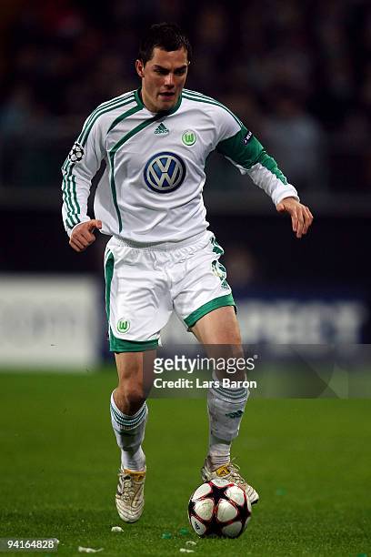 Marcel Schaefer of Wolfsburg runs with the ball during the UEFA Champions League Group B match between VfL Wolfsburg and Manchester United at...