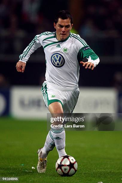 Marcel Schaefer of Wolfsburg runs with the ball during the UEFA Champions League Group B match between VfL Wolfsburg and Manchester United at...