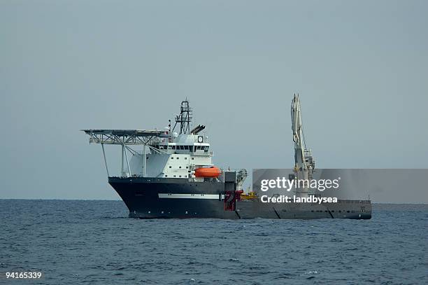 deep ocean work ship with lift and helideck - pipe ship stock pictures, royalty-free photos & images