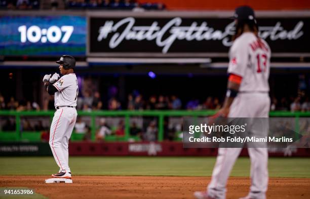 Starlin Castro of the Miami Marlins gestures after hitting a double during the game against the Boston Red Sox at Marlins Park on April 2, 2018 in...