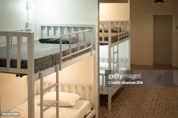 cozy bedroom in hostel - hostel stockfoto's en -beelden