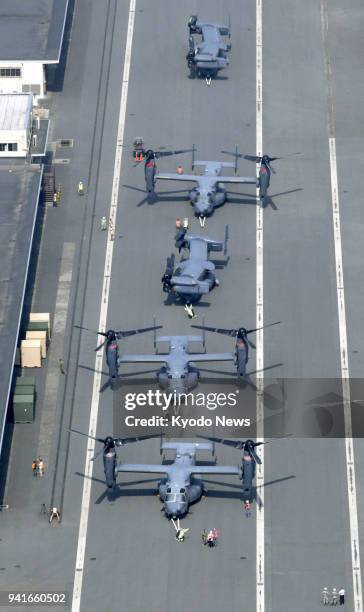 Photo taken April 4 from a Kyodo News helicopter shows U.S. Air Force CV-22 Osprey aircraft that arrived at a U.S. Military facility in Yokohama...