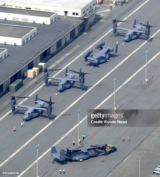 Photo taken April 4 from a Kyodo News helicopter shows U.S. Air Force CV-22 Osprey aircraft that arrived at a U.S. Military facility in Yokohama...