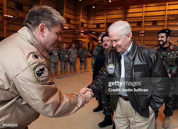 Secretary of Defense Robert Gates meets with members of coalition military at a NATO aviation training facility at Kabul International Airport...