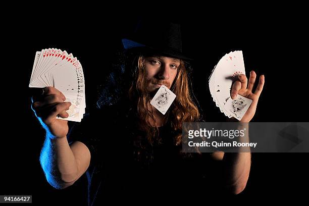 Sebastian Rideaux performs card tricks during a National Institute of Circus Arts Graduates Portrait session at the National Institute of Circus Arts...