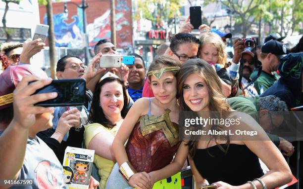 Jessica Altman, daughter of Lynda Carter poses with a Wonder Woman at the Star ceremony for Lynda Carter held On The Hollywood Walk Of Fame on April...