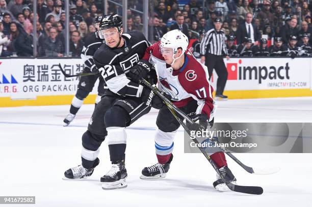 Trevor Lewis of the Los Angeles Kings skates against Tyson Jost of the Colorado Avalanche at STAPLES Center on April 2, 2018 in Los Angeles,...