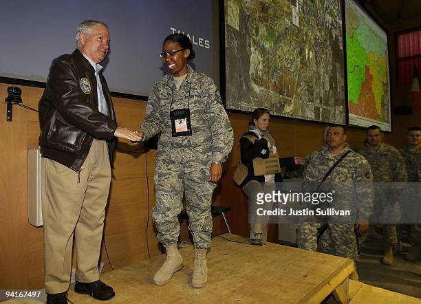 Secretary of Defense Robert Gates greets troops while visiting the I.J.P. At Kabul International Airport December 9, 2009 in Kabul, Afghanistan....