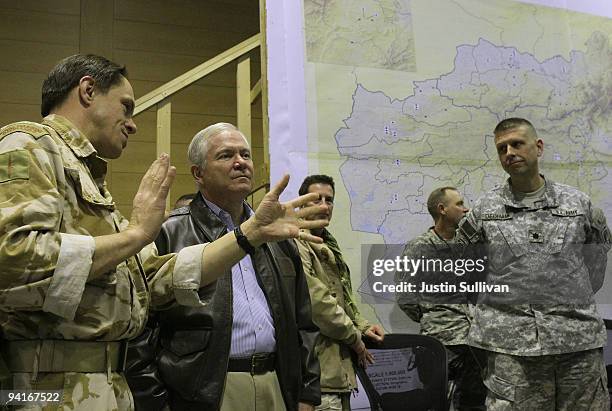 Secretary of Defense Robert Gates is briefed while visiting the I.J.P. At Kabul International Airport December 9, 2009 in Kabul, Afghanistan....