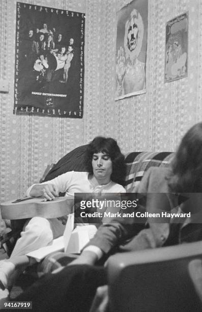 Singer and songwriter Freddie Mercury , of British rock group Queen, during an interview with the Daily Express at his Shepherds Bush flat, London,...