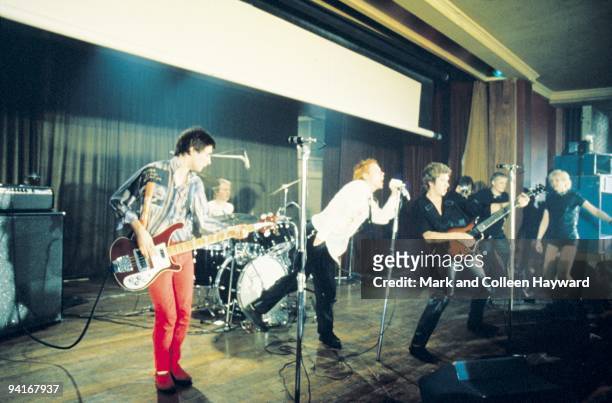 English punk group the Sex Pistols on stage at Notre Dame Hall, London, 15th November 1976. Left to right: Glen Matlock, Paul Cook, Johnny Rotten and...