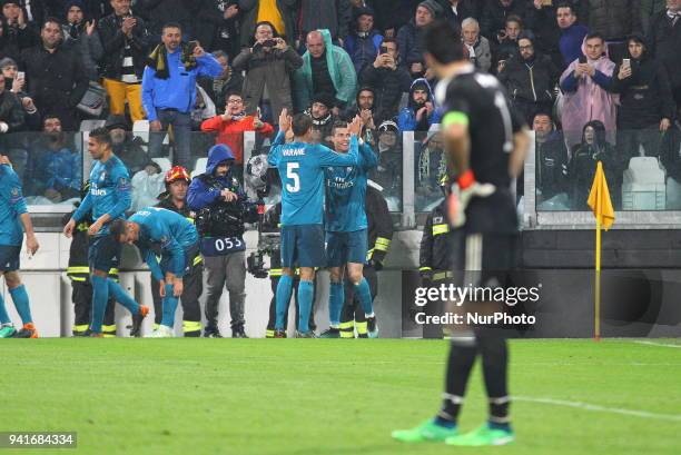 Cristiano Ronaldo celebrates after scoring his second goal during the first leg of the quarter finals of the UEFA Champions League 2017/18 between...