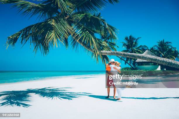 senior couple enjoying holidays at canareef resort maldives, herathera island, addu atoll - aged to perfection stock pictures, royalty-free photos & images