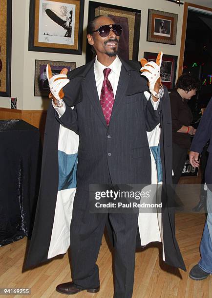 Musician Snoop Dogg attends CD signing of "Malice N Wonderland" and donates memorabilia to Hard Rock Cafe Hollywood on December 8, 2009 in Los...