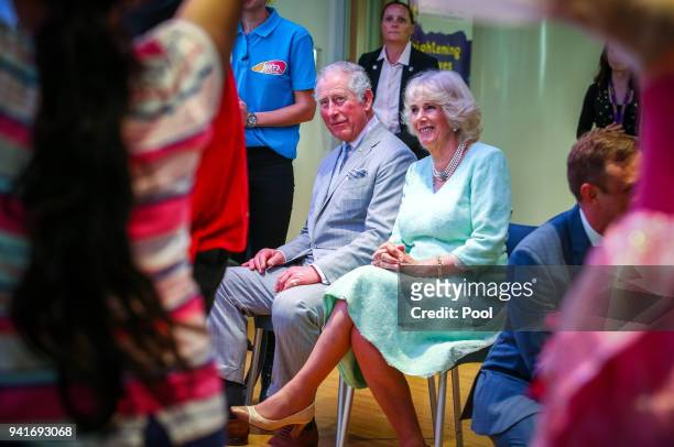Prince Charles, Prince of Wales and Camilla, Duchess of Cornwall watch a performance at the Starlight room during an official visit to the Lady...