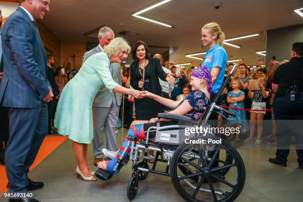 Prince Charles, Prince of Wales and Camilla, Duchess of Cornwall greet Abbi Head - 13 of Brisbane during an official visit to the Lady Cilento...