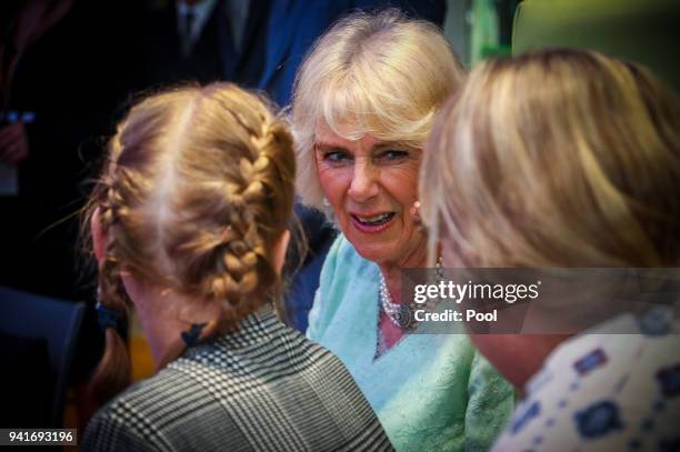 Camilla, Duchess of Cornwall talks with patients while watching a performance at the Starlight room during an official visit to the Lady Cilento...