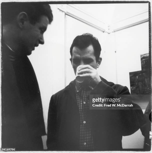 American musician, composer, and conductor David Amram and author Jack Kerouac talk together at the Hansa Gallery , New York, New York, March 16,...