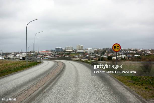 speed limit sign at reykjavik, iceland - traffic light empty road stock pictures, royalty-free photos & images